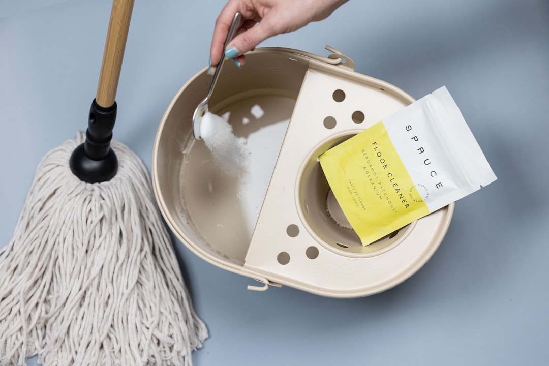 home-img adding-cleaning-powder-to-a-mop-bucket-dym3cv1r4i0